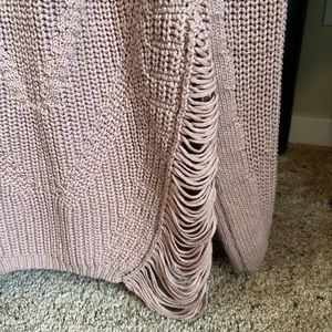 Sweater with cutouts